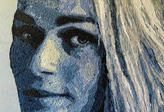 Irene Schouten, schilderij van snippers van oude spijkerbroeken, ook wel denimkunst genoemd. Denim, spijkerstof